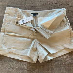 Theory tan kaelin shorts, size 4. Brand new.